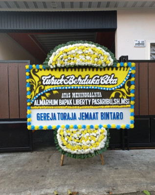 Papan Bunga Duka di Kairagi Dua